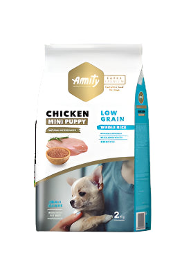 A package of Amity brand mini puppy dog food with chicken. The bag is predominantly white with images of the product and a puppy on it.