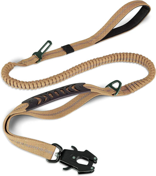 Tan dog leash with black metal clip on a white background